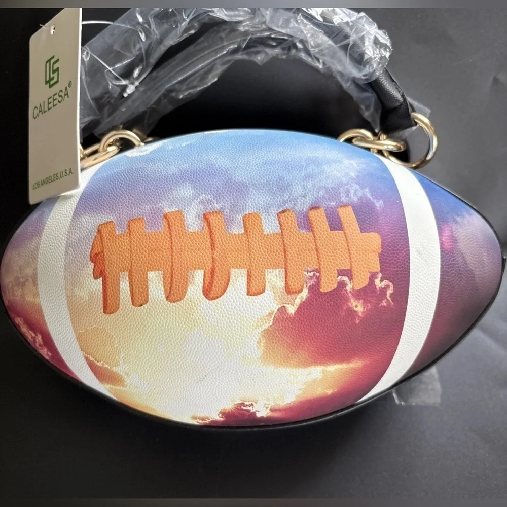 NWT-whimsical tie-dyed clouds  Pristine pebbled Rugby football purse gold chain